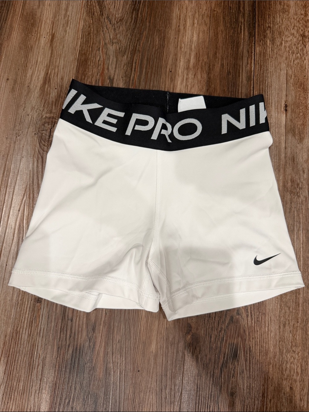 Nike Pro White girls Athletic Shorts with Black Logo Waistband
